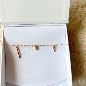Mejuri Gold Mini Charm Bracelet with Key and Lock Charms